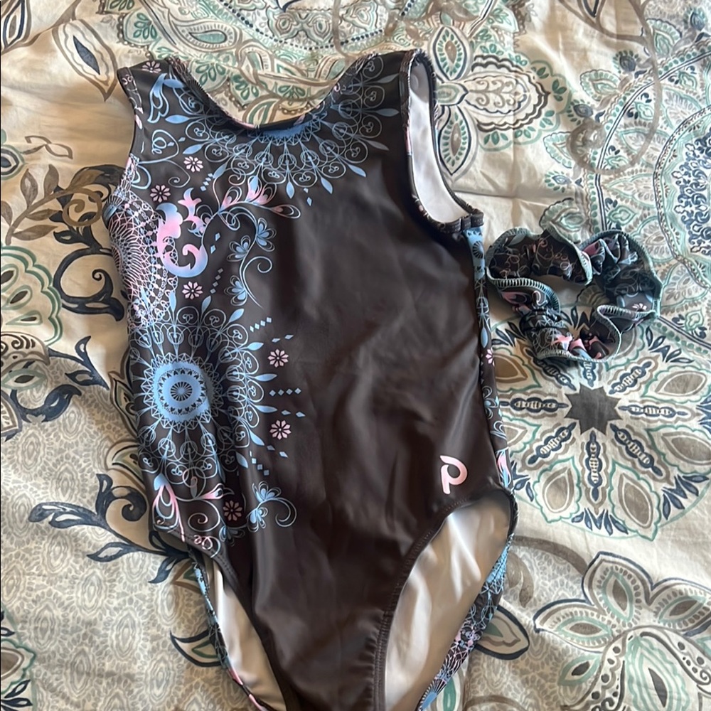 Stunning girls plum leotard. I believe it is a child large but tag was cut out.